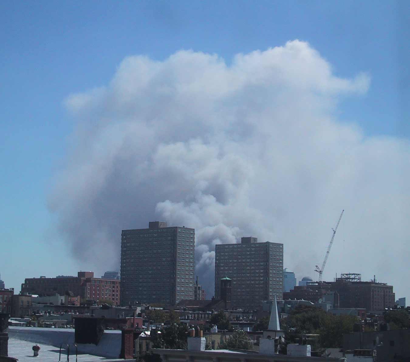 Lower Manhattan skyline with smoke where the World Trade Center stood