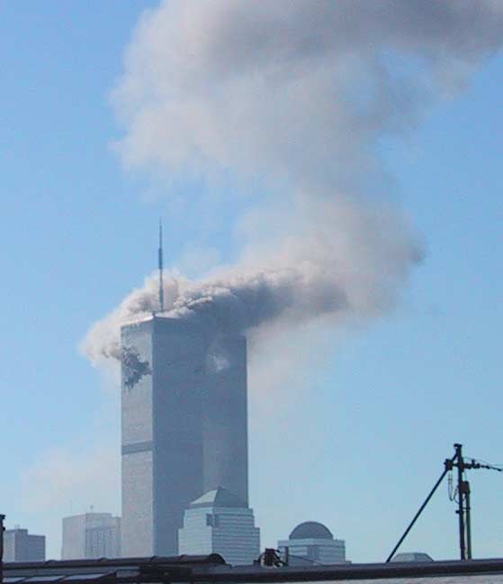 World Trade Center north tower with a hole in the north face, about 9:00 AM on 9/11/01